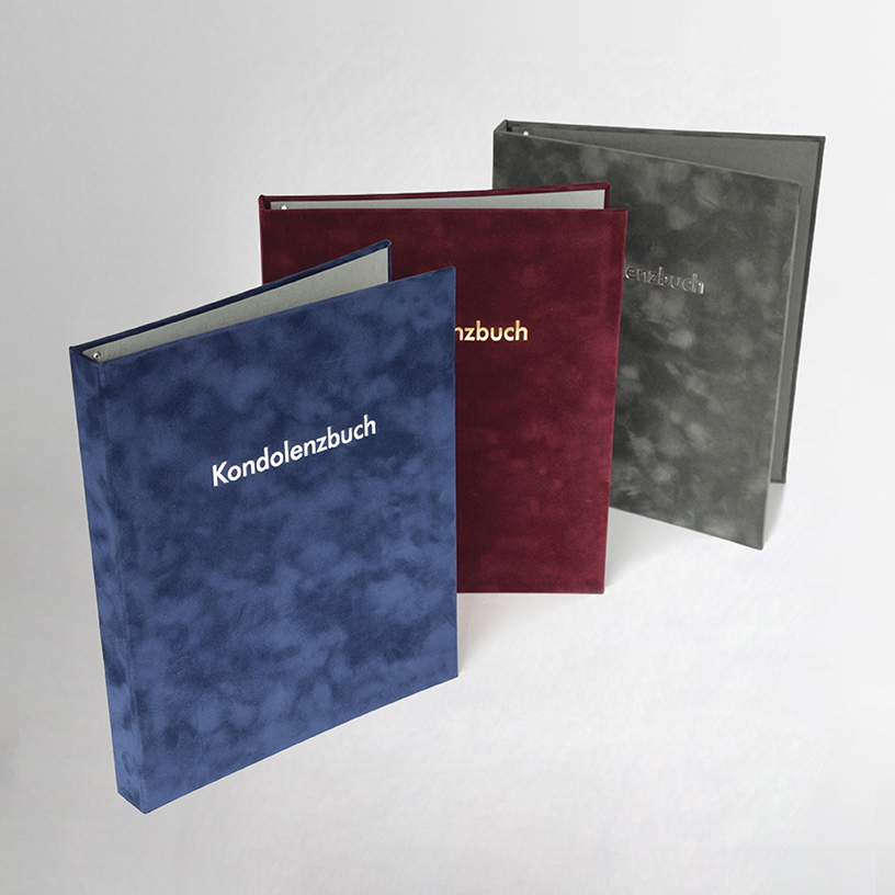 Kondolenzbücher aus Velour, in blau, rot und grau mit Silberfolienprägung | Produkte für Bestatter © Elektronik Printing
